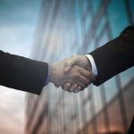 The two giant companies will merge in October